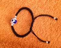 Pulsera ajustable de nudos macrame hecha a mano ojo turco